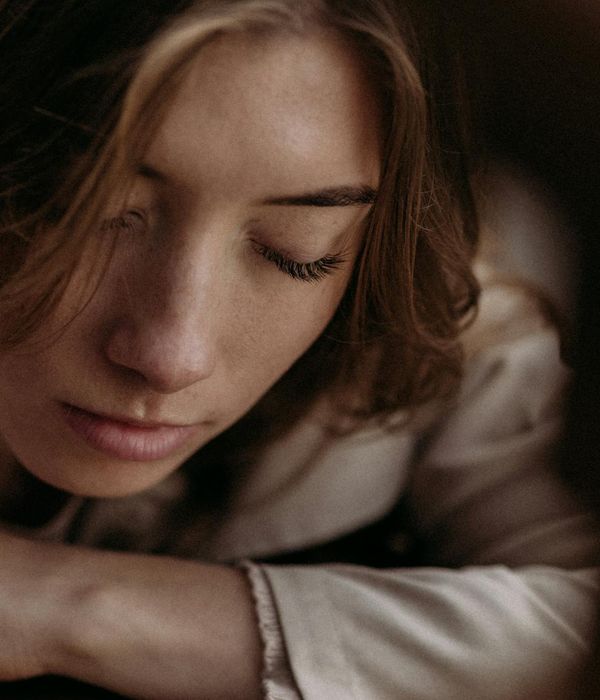 Person in a state of calm focus during a gentle exercise routine, with lime light accents.